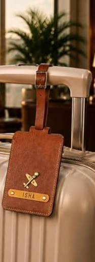 The Junket Personalized Luggage Tag for Men & Women | Custom Engraved Name Tag with Charm | Premium Leather Travel Accessory | Raksha Bandhan Gift for Brother, Sister & Frequent Travelers (Tan)